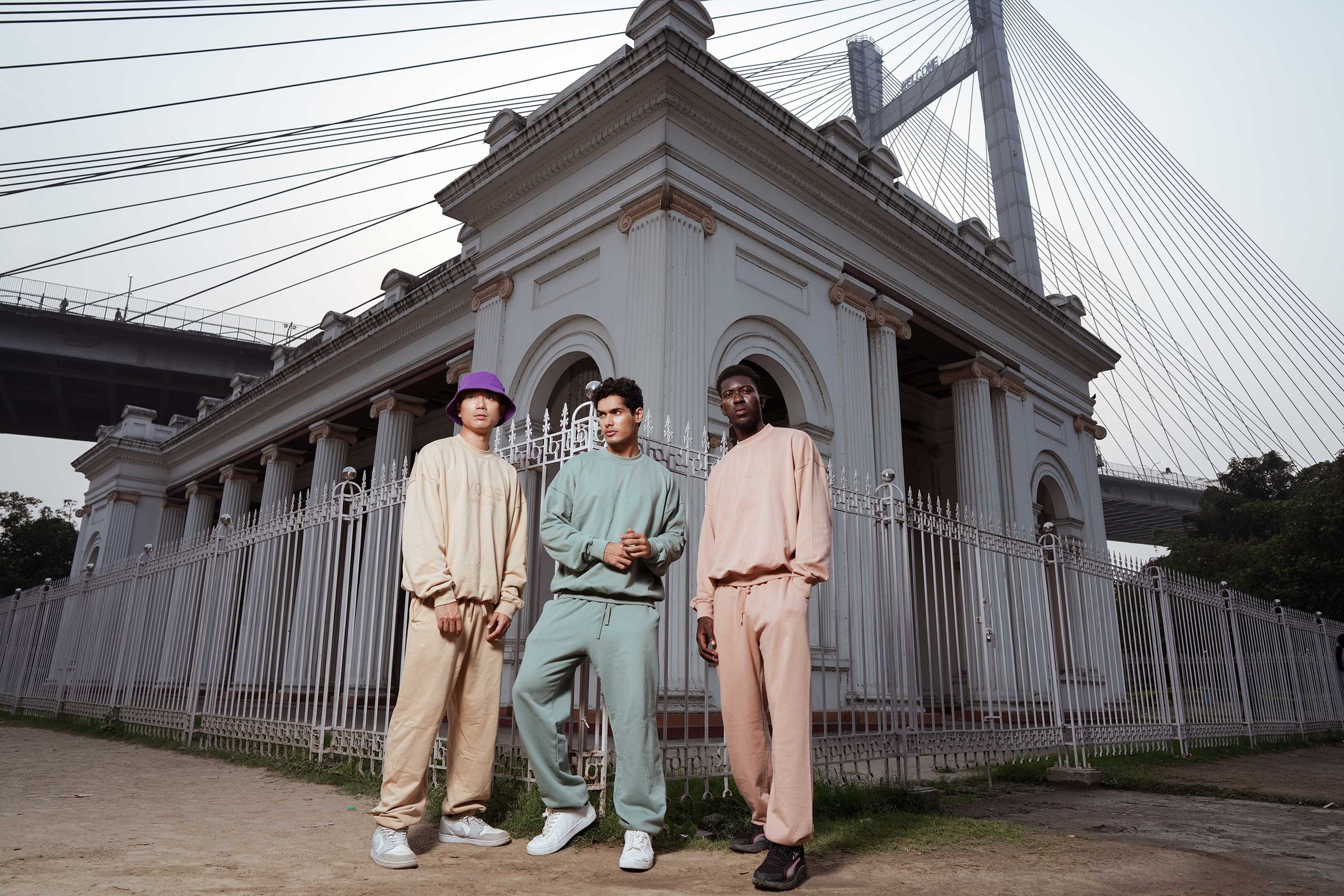 Three models under a suspension bridge
