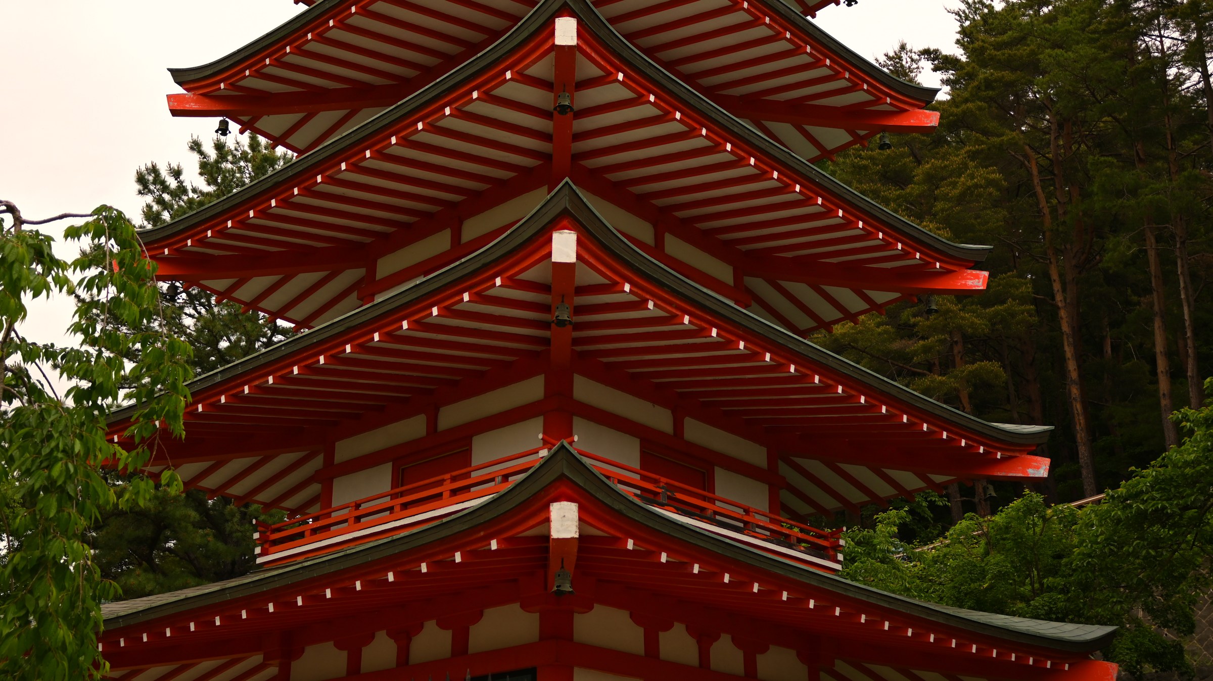 Red pagoda against blue sky