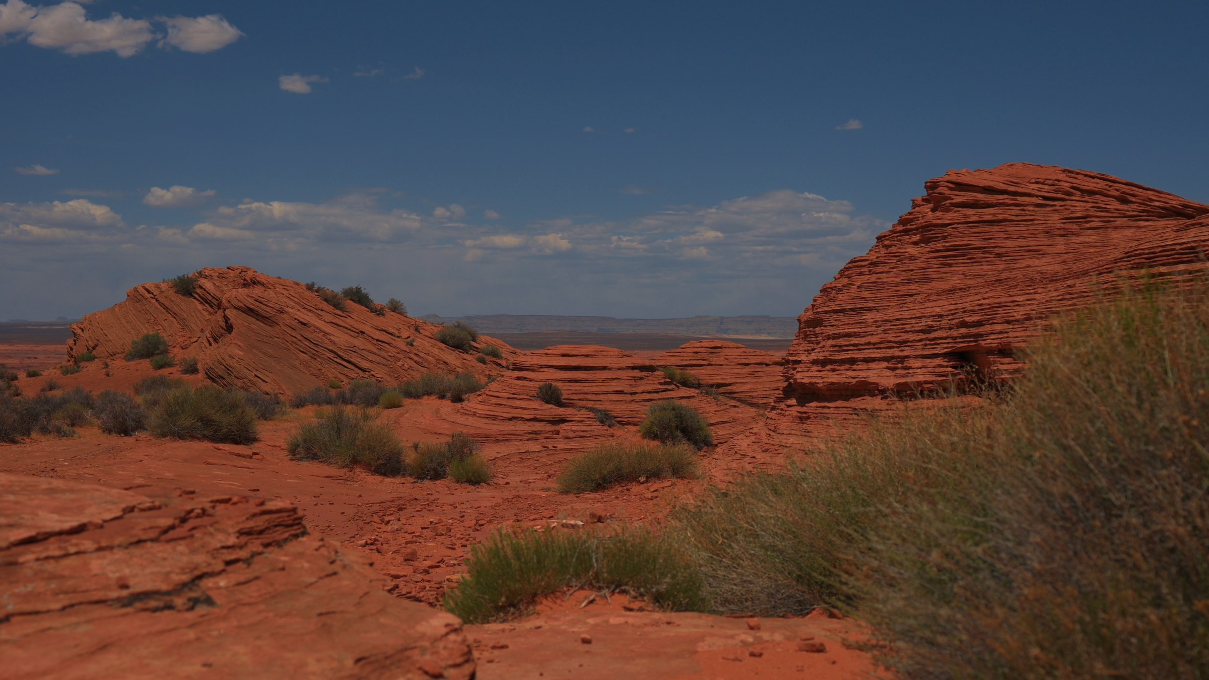Red rock plateau under a wide sky
