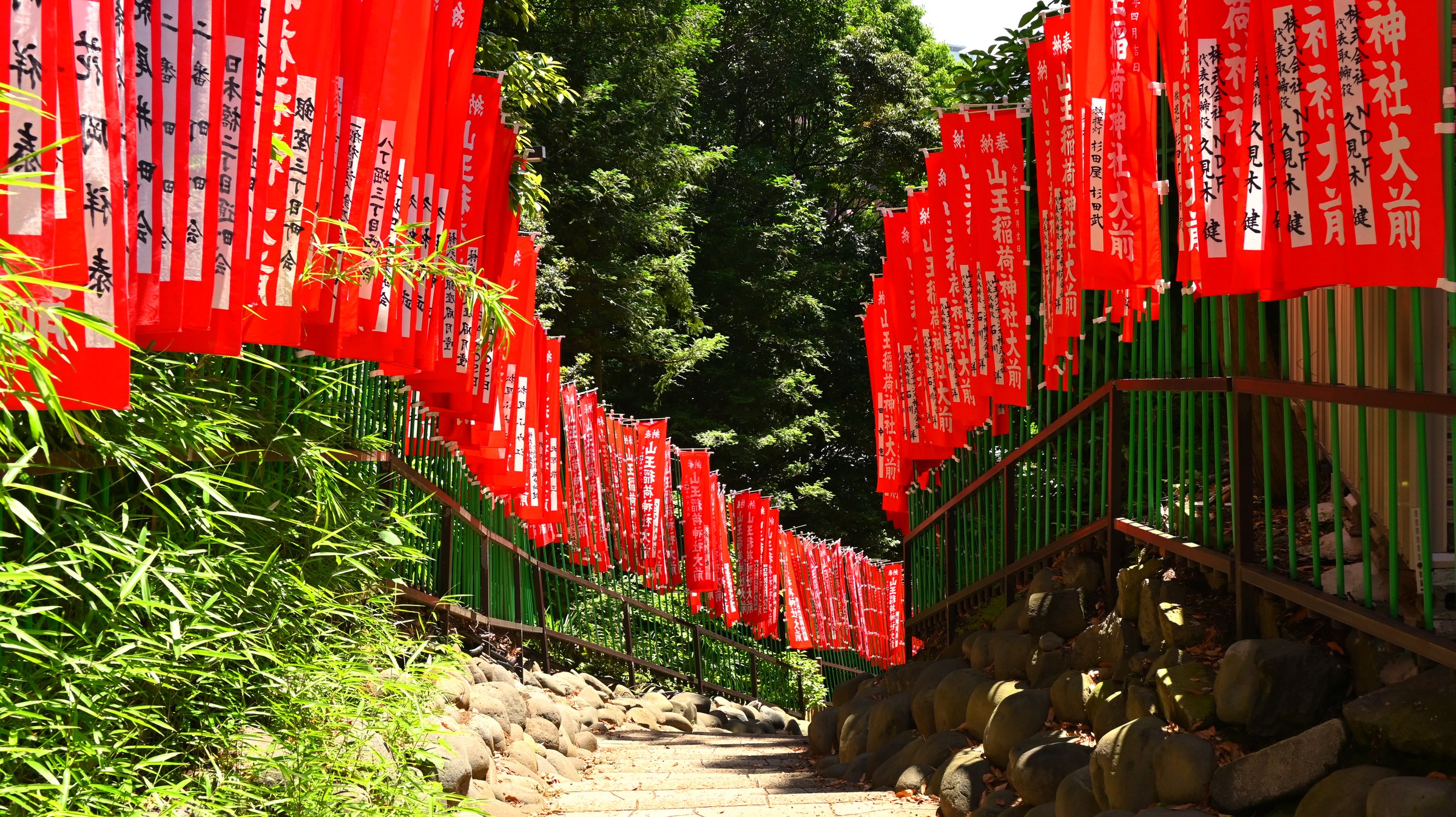 Red banners along a shrine path