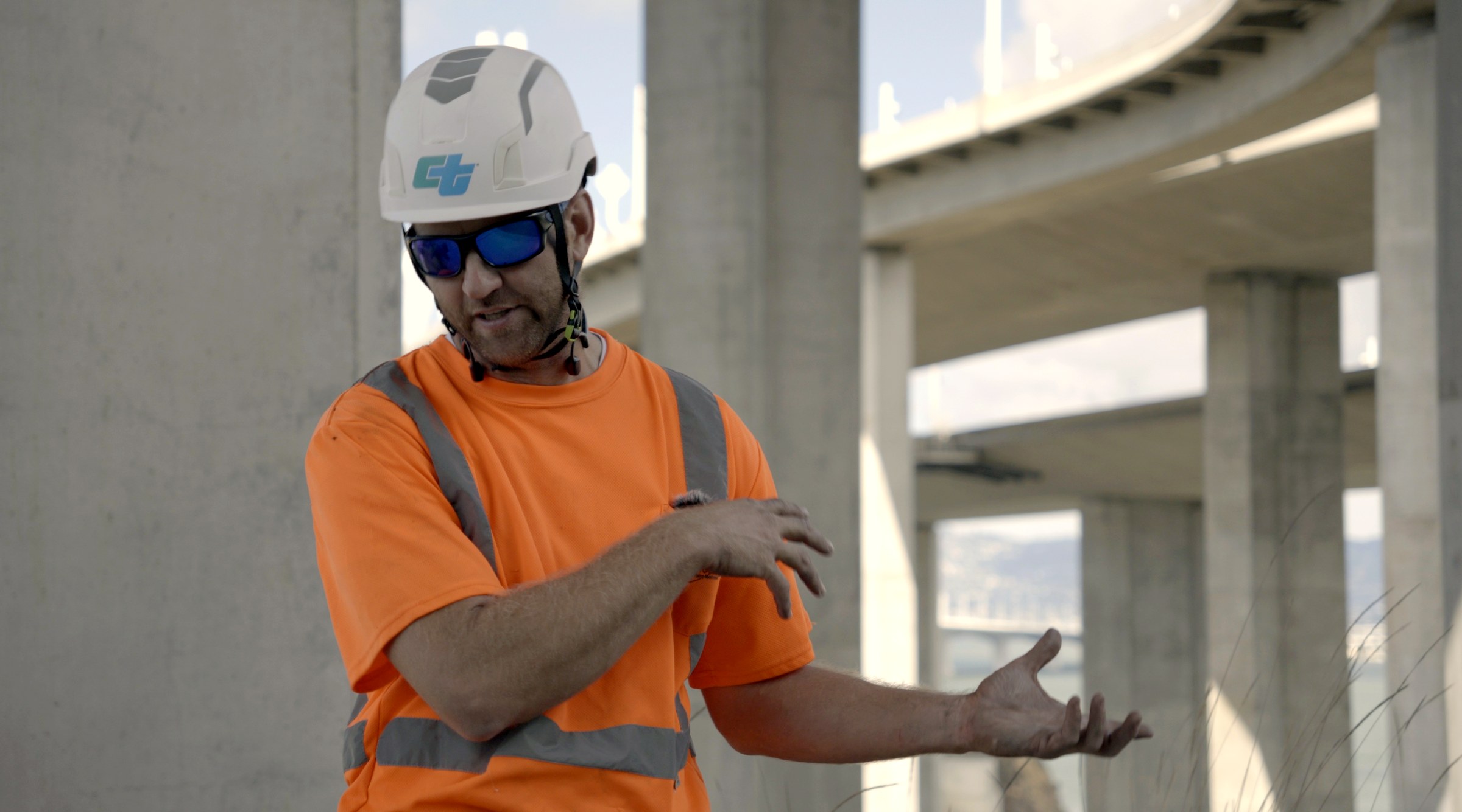 Worker in orange on site