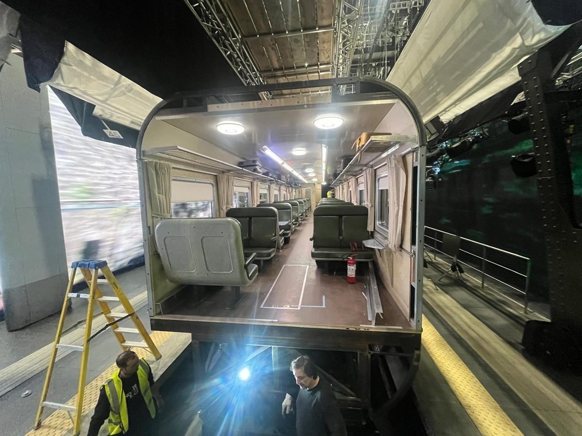 Practical train car interior set on a stage