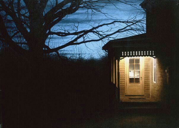 Porch light against a night sky